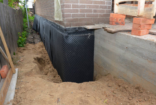Happy homeowners after waterproofing job in Chattanooga